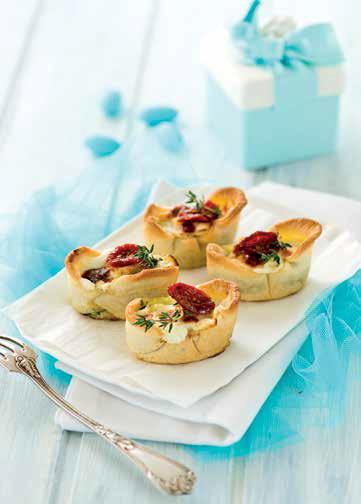 Mini quiche con pomodorini secchi e formaggio